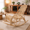 The Rohe Rocking Chair is placed on a light rug in a living room featuring wooden furniture, houseplants, and gentle natural light.