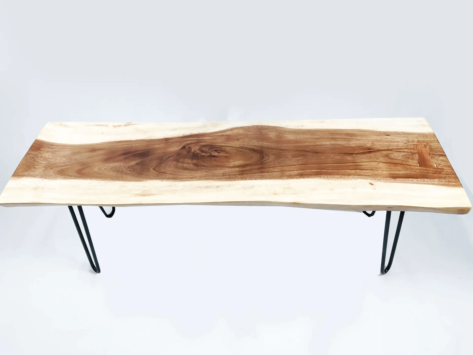 The Teak Art Bench 2 (Left 1 piece) features a wooden seat with a natural live edge and black metal hairpin legs, displayed on a white background.