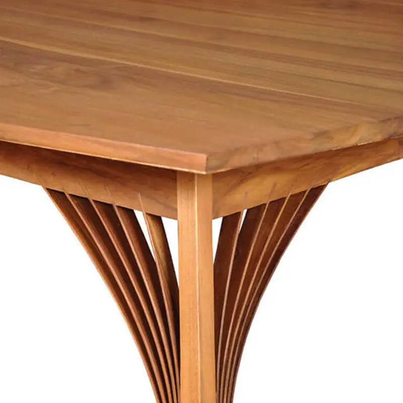 Close-up of the Bravo TV Console (Clearance) featuring a unique, fan-like leg design. The tabletop boasts a smooth finish with visible wood grain. Close-up of the Bravo TV Console (Clearance) featuring a unique, fan-like leg design. The tabletop boasts a smooth finish with visible wood grain.