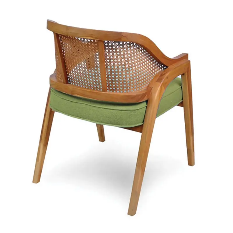 Wooden chair with a curved backrest, featuring a woven cane panel and a green cushion on the seat.