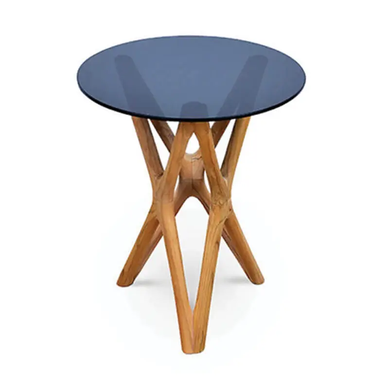 The Trio Side Table is a small, round glass-top table featuring an intersecting wooden base.