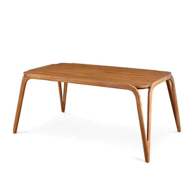 The Trombone V Dining Table is a rectangular wooden table with angled legs.
