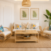 A bright living room featuring the Greeks Infinity Rattan Sofa, a jute rug, tropical print pillows, framed palm wall art, and a large potted plant in the corner.