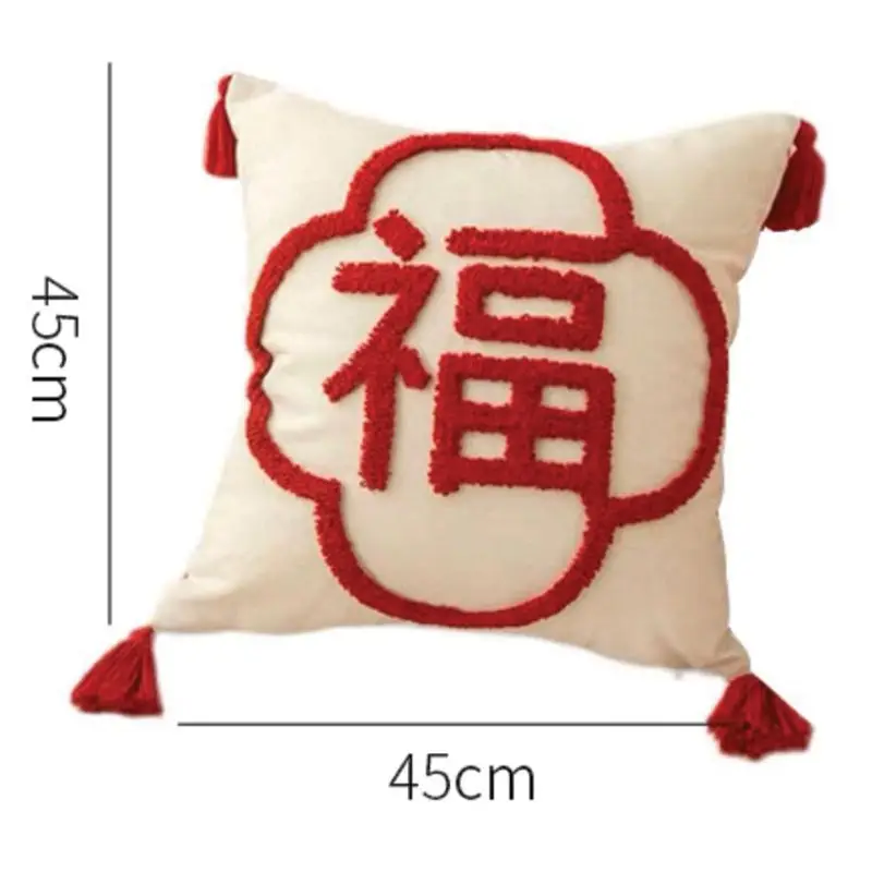 The Blessing Cushion Cover features red Chinese character embroidery symbolizing "good fortune" on a white backdrop, complemented by red tassels at each corner. Dimensions: 45cm x 45cm.