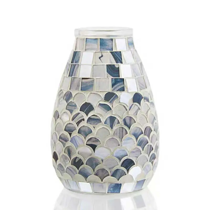 A mosaic vase with an elongated, teardrop shape featuring a pattern of gray, white, and blue tiles.